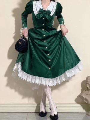 Forest green velvet classic lolita dress with color block design, white peter pan collar and puffed short sleeves, front view on model wearing stockings and bow shoes