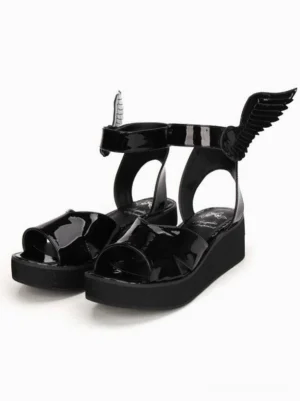 Black glossy lolita wing platform sandals three-quarter front view showing thick wedge sole adjustable ankle strap decorative wing ornaments glossy finish