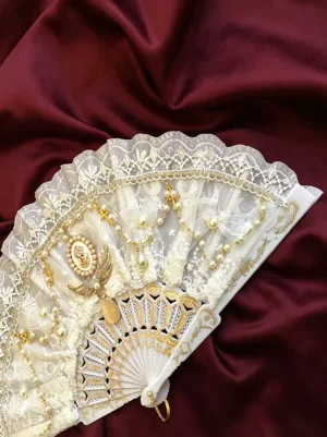 Carved golden fan bones pearl pendants decorative folding hand fan side view burgundy fabric rococo lolita style