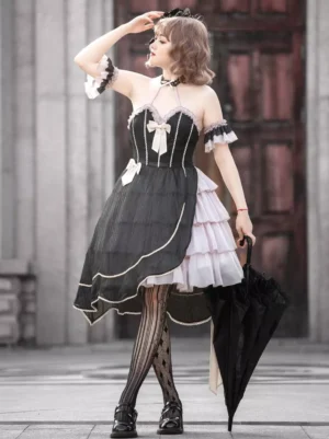Gothic asymmetrical lolita dress tailor made custom color full-body side view female model vintage stone courtyard off-shoulder design black-white tiered skirt striped hosiery