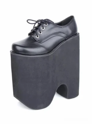 Single black Gothic Lolita platform lace-up shoe, three-quarter front side view showcasing ultra-high block platform heel, round closed toe design, and metal eyelet lace-up closure system