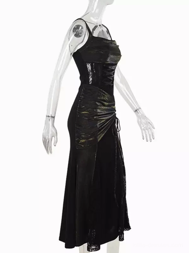 Black gothic mermaid dress on mannequin showing corset-style bodice ruched skirt detail and iridescent trim dress alone styling
