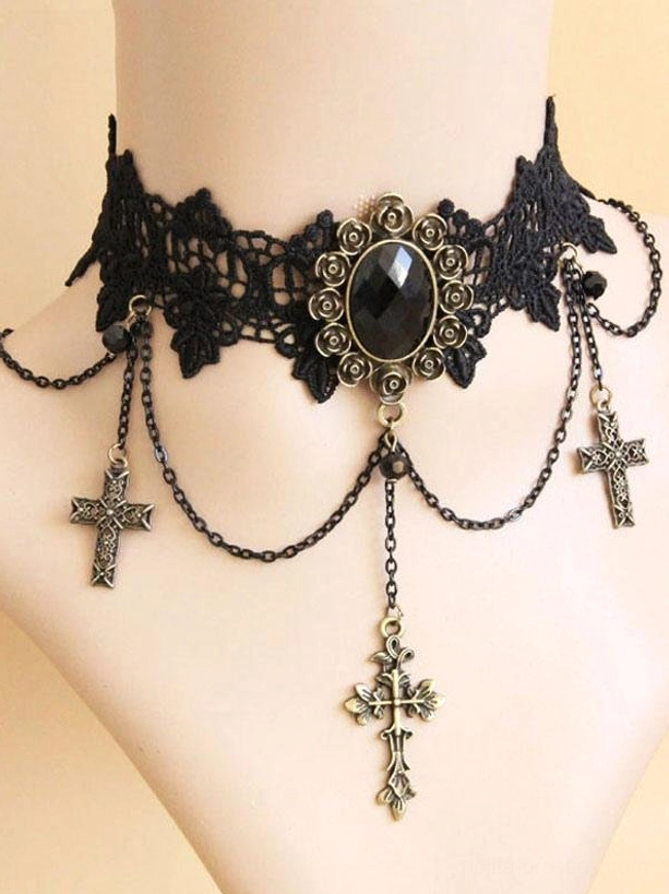 gothic lace choker side front view on fabric mannequin featuring black floral lace band with central black gem buckle and dual cross pendants