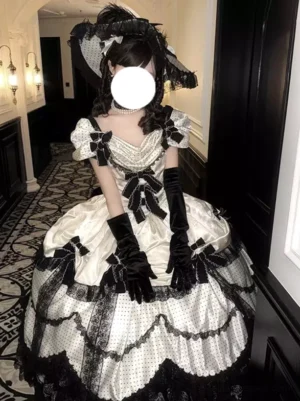 Gothic Lolita black and white ball gown off-shoulder puff sleeves front three-quarter view with lace skirt ruffles