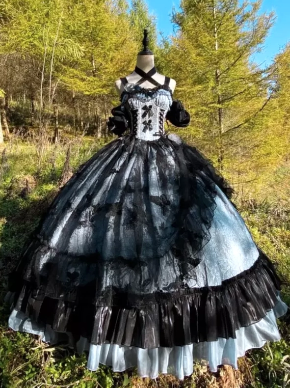 Hem detail of gothic Lolita ball gown showing cascading ruffled layers and tulle construction