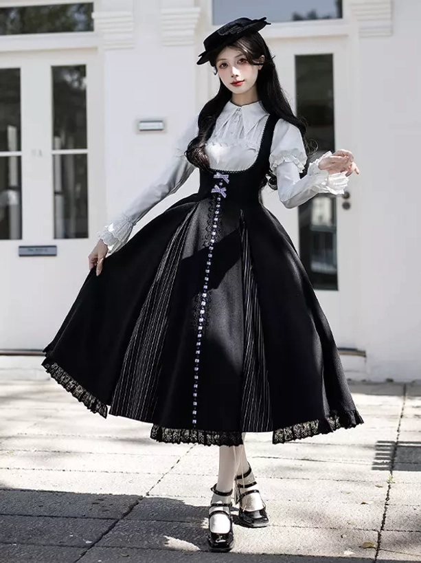 Gothic Lolita black A-line dress with lace trim hem side full-body view model wearing beret and handbag