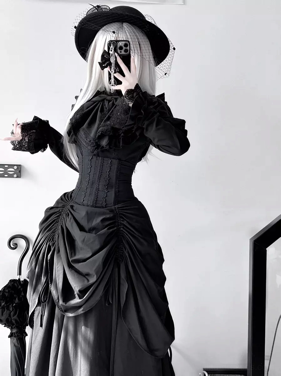 Gothic black lolita dress front mirror selfie with veiled hat, ruffled lace collar, corset waist, and full long skirt silhouette