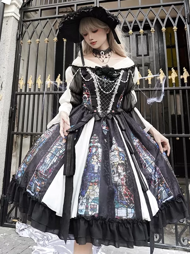 Gothic Lolita black dress full front standing pose highlighting voluminous stained glass skirt pearl chain decoration ruffled hem