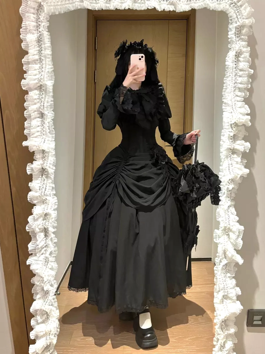 Gothic lolita dress set side mirror selfie view with model holding black umbrella, matching hair accessory, and lace-trimmed sleeves