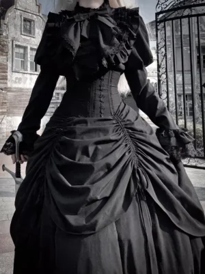 Gothic lolita dress close-up front view showing big ruffled bow collar, corset waist detail, and ruched satin skirt