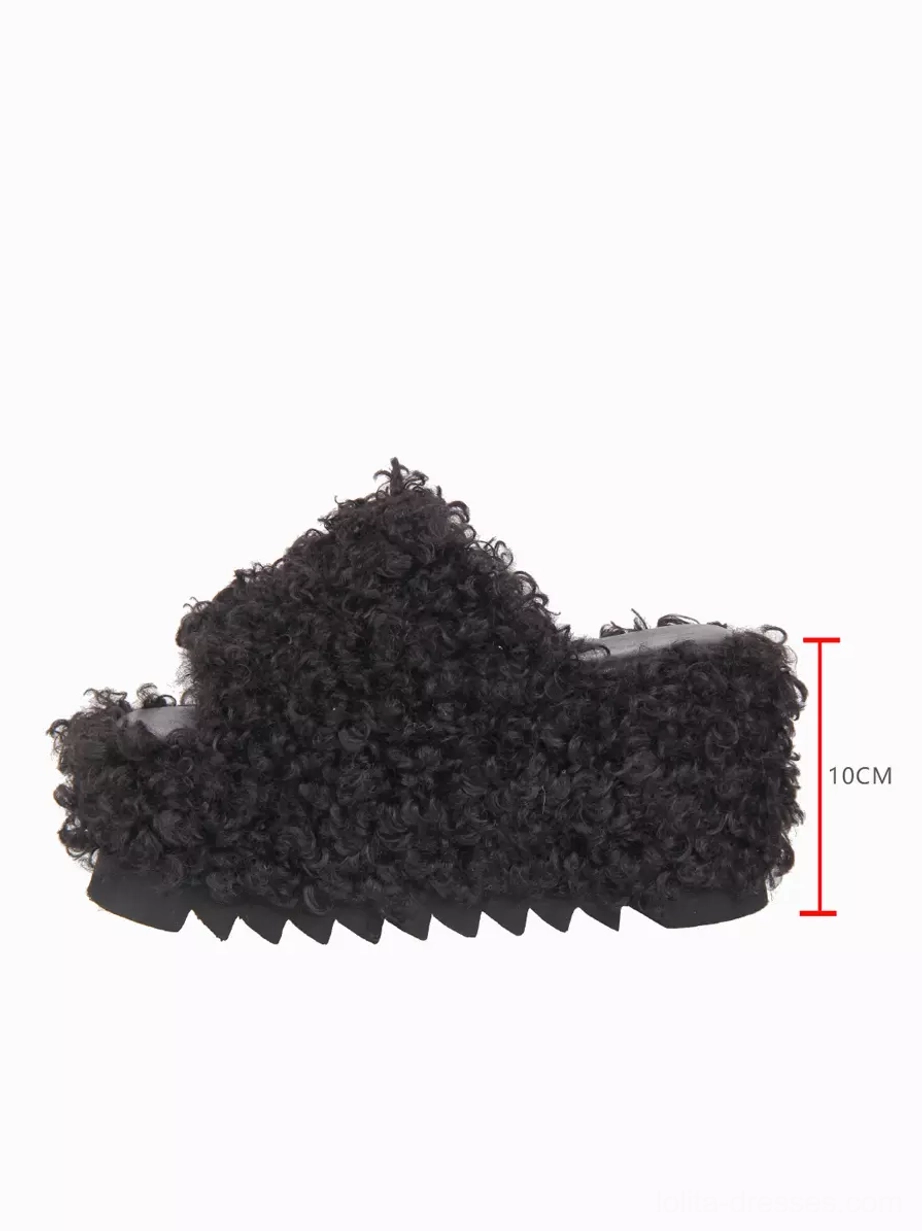 Black gothic lolita fluffy platform sandals three-quarter side view showing 10cm marked heel height serrated outsole design