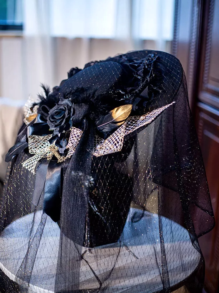 Black and gold glitter gothic lolita wide brim hat with tulle veil, rear oblique view showing full structure, mesh overlay, and decorative rose and feather accents