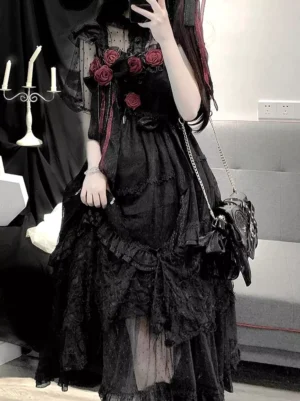 Gothic lolita black jsk dress half body mirror selfie with sheer mesh overlay and ruffled waist trim detail