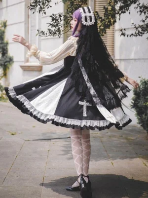 Gothic lolita black veil headdress styled in complete outfit worn by model outdoors, paired with gothic dress and purple wig, demonstrating full aesthetic coordination and wearability