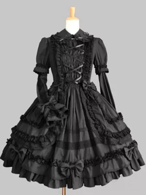Gothic lolita long-sleeve dress with black lace-up corset front and puffed sleeves, front view on dress form showing crisscross lacing, ruffled doll collar, and layered skirt with bow embellishments