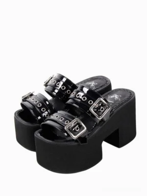 Gothic lolita black patent platform sandals flat lay front view showing dual adjustable buckle straps chunky block wedge heel and round toe design