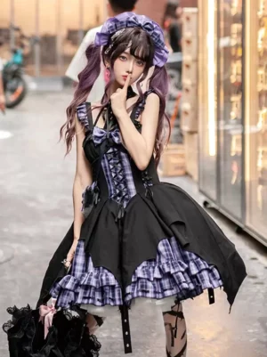 Black plaid Gothic Lolita dress with detachable straps and choker, side three-quarter standing pose outdoor streetwear
