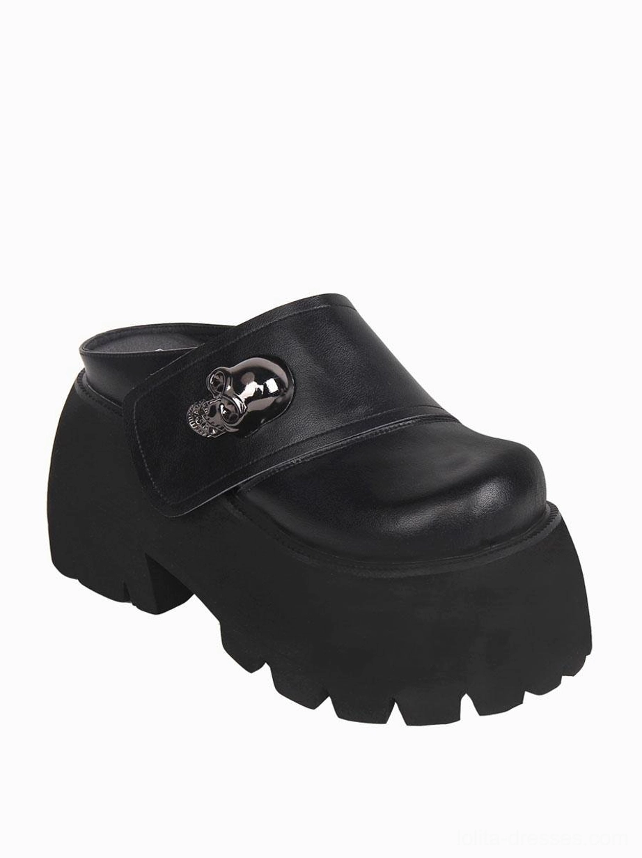 Black Gothic platform mule shoes single shoe side three-quarter view silver skull buckle chunky platform
