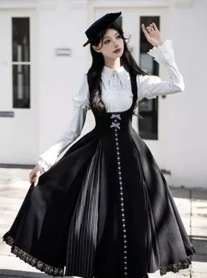 Gothic Lolita black suspender skirt with vertical stripe details three-quarter front view female model street