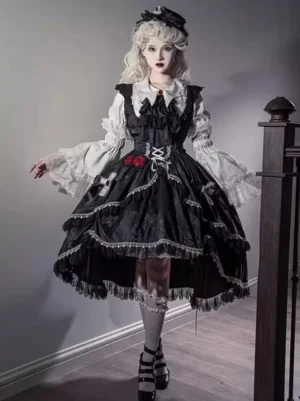 Gothic Lolita short-sleeve blouse with bat-shaped doll collar and lace-up front closure, white cotton blouse with ruffled lace cuffs worn on model
