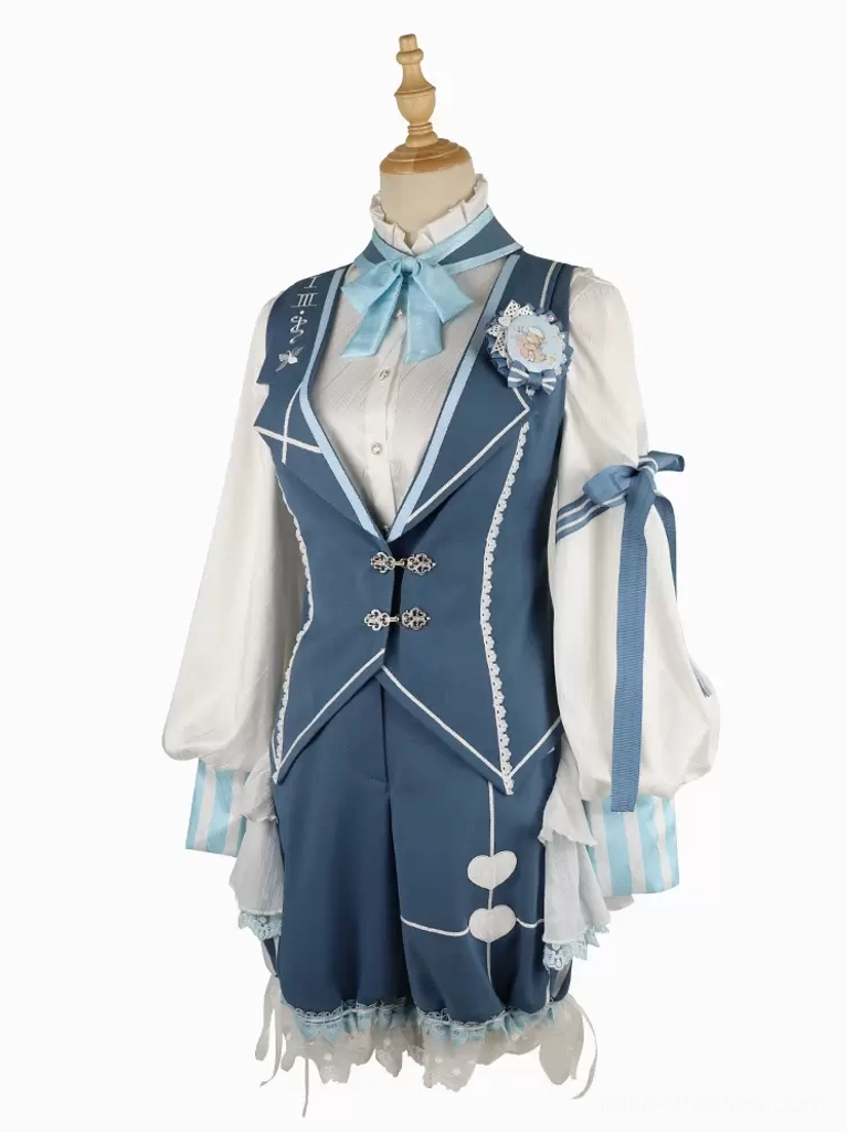 Mannequin display of ecru white Gothic Lolita blouse with fabric bow accent and trims