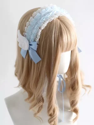 lolita headdress pale blue ruffled lace angel wing decor blue satin bow three-quarter view