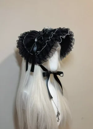Gothic Lolita headdress back detail showing satin ribbon bow and adjustable chin straps, rear three-quarter view on mannequin with long white wig, demonstrating structural construction