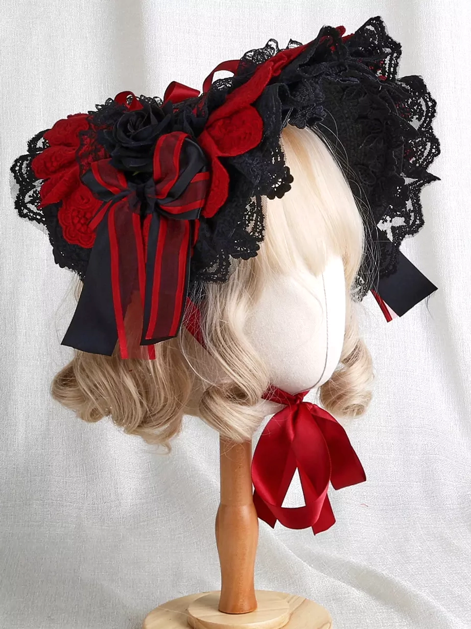 Gothic Lolita bonnet rear oblique angle showcasing black lace edging, striped ribbon bows, and intricate back construction with two-tone styling