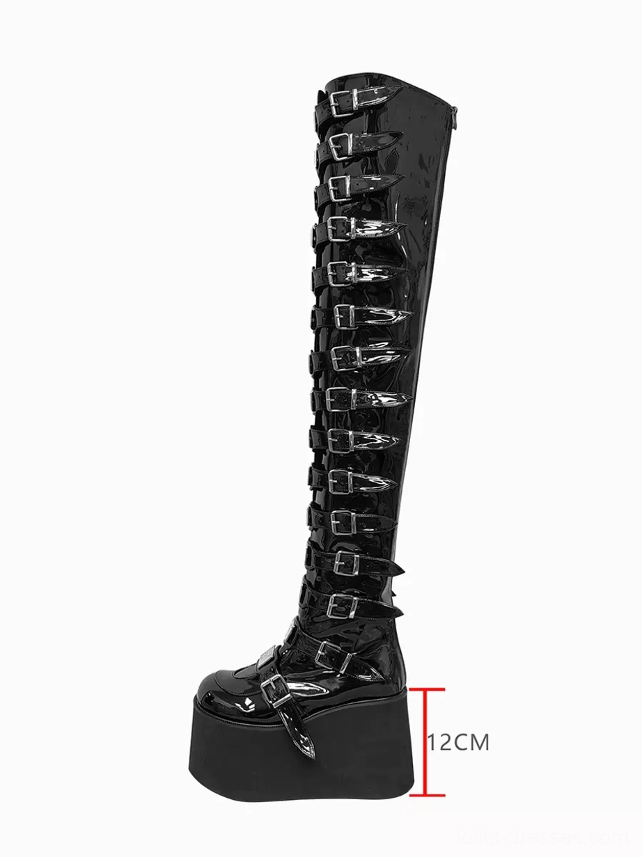 Left side flat view of over-the-knee gothic platform boot with marked 12cm wedge heel height and full-length buckle and grommet decorations on white background
