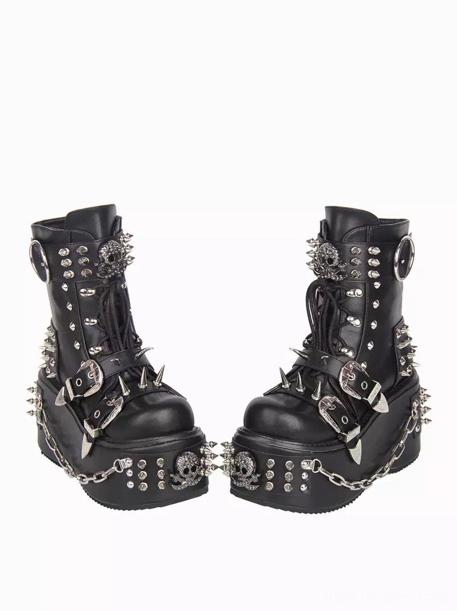 Back-to-back view of Gothic Lolita boots showing rear silhouette with silver studs, skull decorations, extensive chain details, dual buckle straps, and mid-calf shaft height coverage