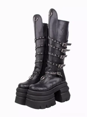 Black Gothic Lolita platform boots with metal grommets and adjustable buckle straps, front three-quarter view on white background