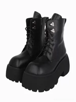 Gothic lolita platform boots black PU leather with silver grommets square toe front paired view studio