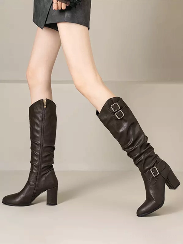Gothic lolita chunky block heel boots sole and heel detail dark leather round toe professional shot