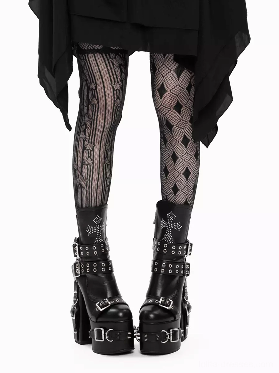 Gothic lolita platform boots styled on model wearing patterned fishnet tights and black asymmetric skirt, front lower body view