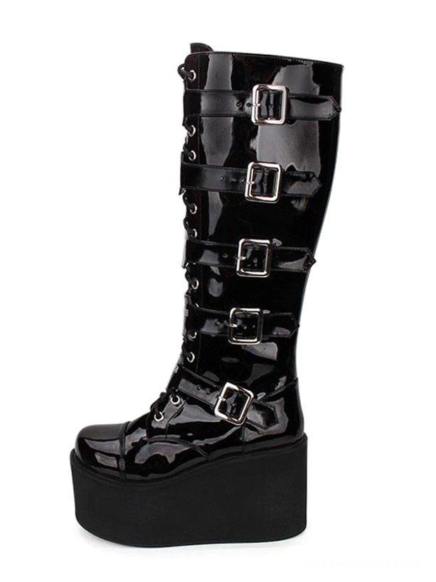 Detailed front view of metal grommets and cross-decorated lace-up closure on Gothic Lolita platform boots showing adjustable eyelet construction