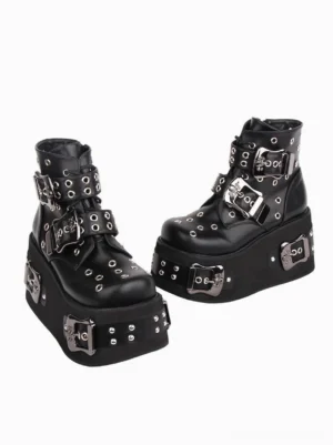 Gothic Lolita platform boots side three-quarter view paired display decorative metal buckles studded base