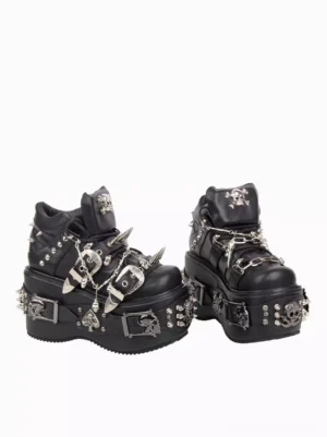 Side profile view of gothic punk platform lolita ankle boots showing decorative metal buckles skull studs chain straps and elevated wedge sole design