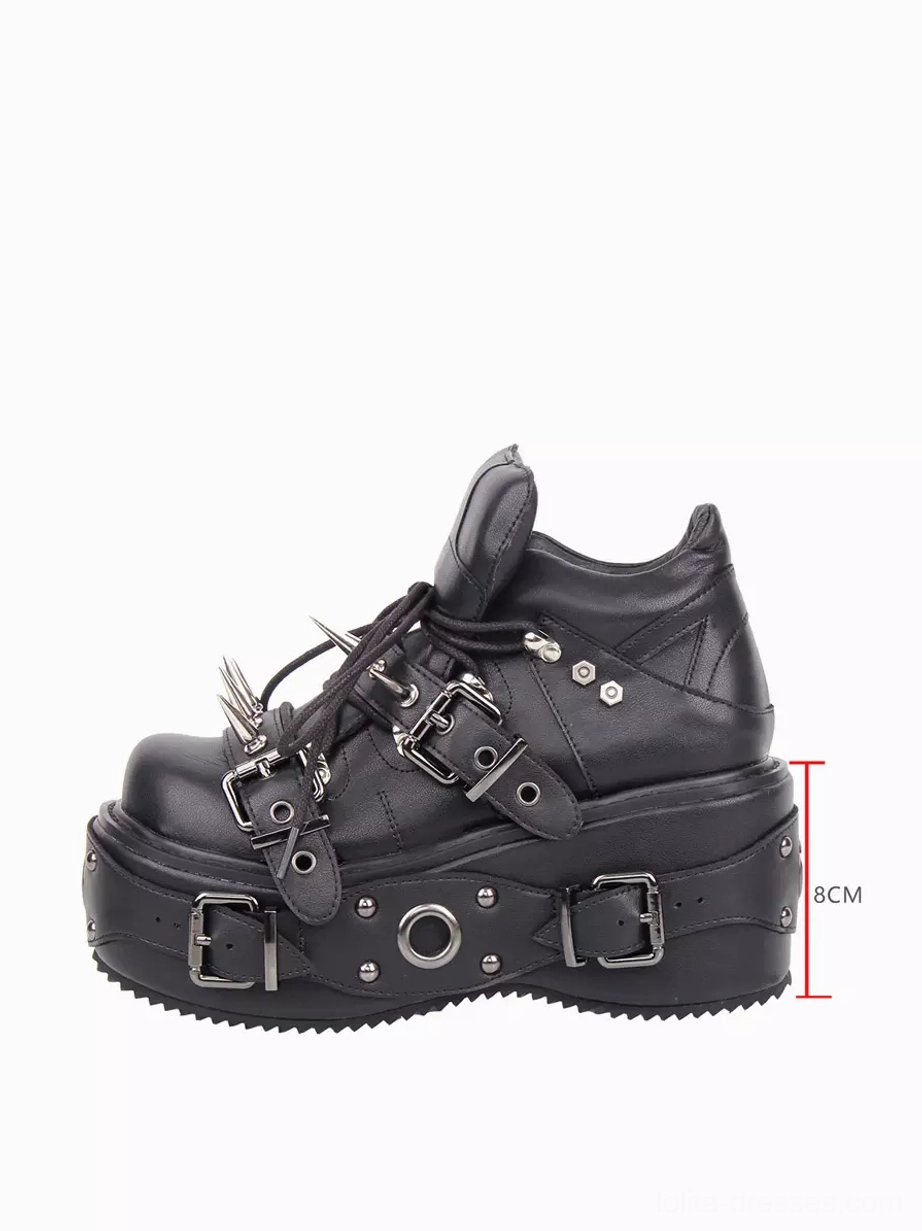 Right side profile view of black Gothic Lolita wedge heel boots showing 8cm heel height metal buckles and spike accents