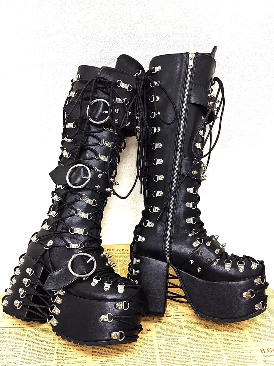 gothic lolita boots right side profile view showing side zipper silver hardware decorations thick platform wedge heel vintage aesthetic background