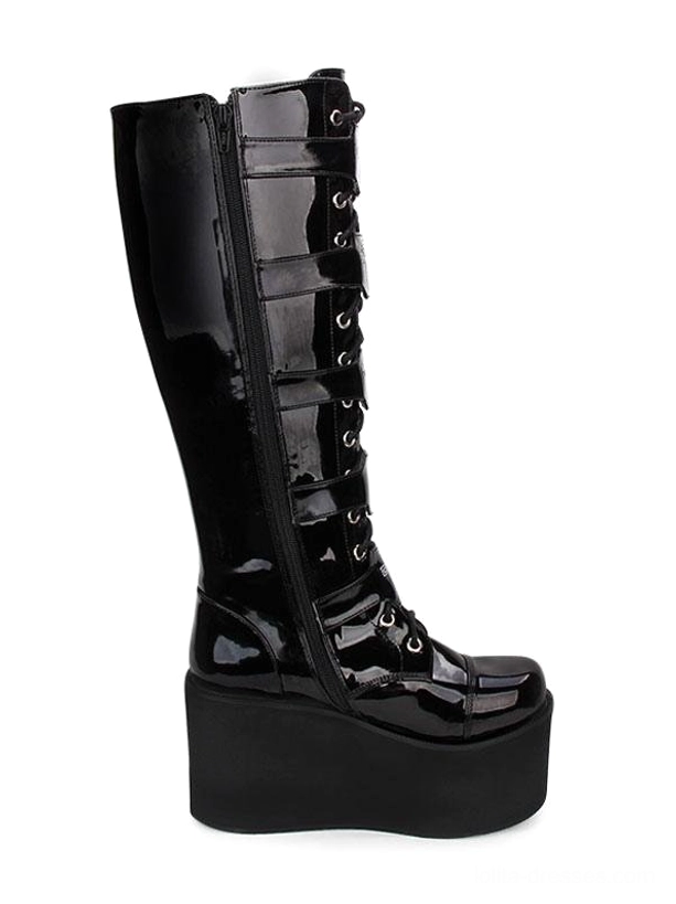 Close-up detail of black patent leather Gothic Lolita boot side zipper hidden fastening system on knee-high shaft