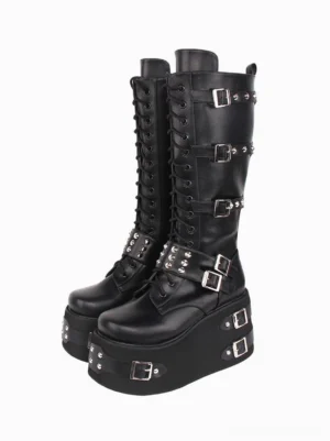 Gothic lolita boots frontal three-quarter view displaying lace-up front studded straps thick wedge platform sole