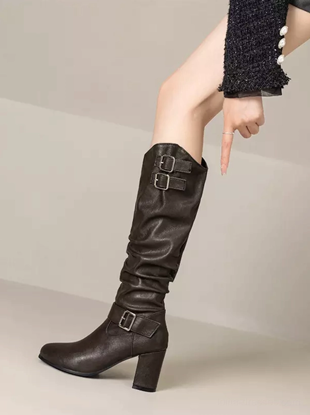 Gothic lolita boots wrinkled PU leather texture close-up metal grommets dark fabric detail shot
