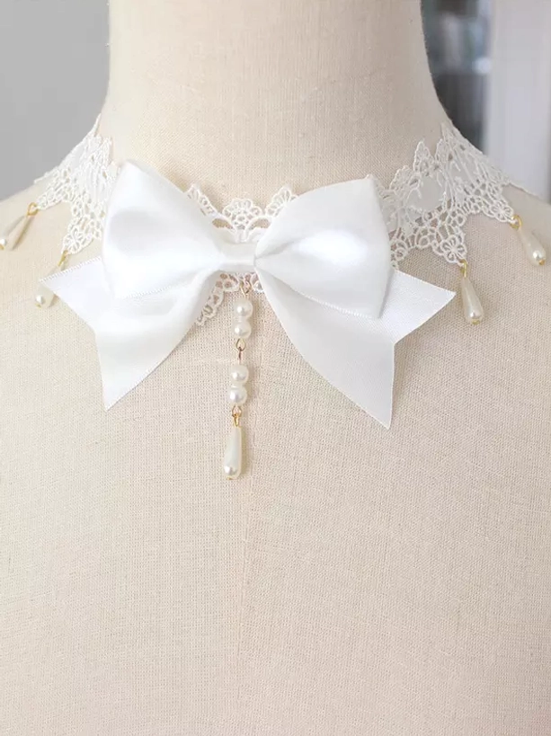White ivory gothic lolita bow choker with cream lace trim pearl drop tassel and side bead charms ornament detail