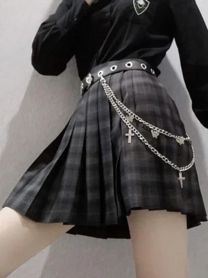 Gothic Lolita chain belt with black leather strap, double-layer silver metal chains, cross and winged pendant charms, metal eyelets detail, worn by model indoors
