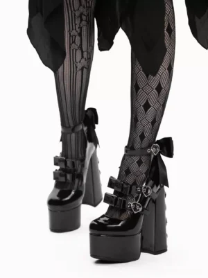 Gothic Lolita chunky heel platform boots worn with argyle fishnet tights and black gothic skirt rear three-quarter view