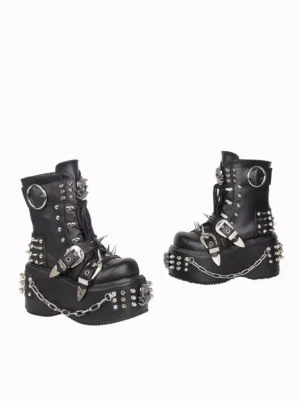 Single Gothic Lolita combat boot side profile showcasing skull studs, spike trims, large round buckle, chain accents, lace-up vamp design, and substantial wedge platform heel