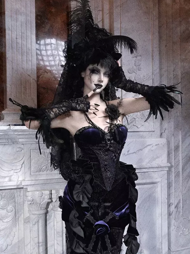 Gothic lolita corset bustier styling with coordinated lace accessories and ruffled trim details on black velvet foundation