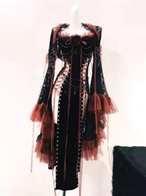 Gothic Lolita black and red corset dress with asymmetric ruffle hem and chain details front oblique view on mannequin