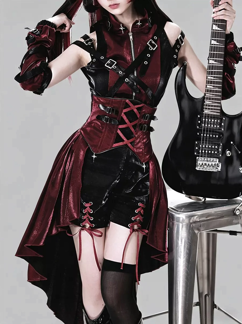 Close-up three-quarter front view of gothic lolita corset dress highlighting lace-up corset, buckle strap decorations and black shorts