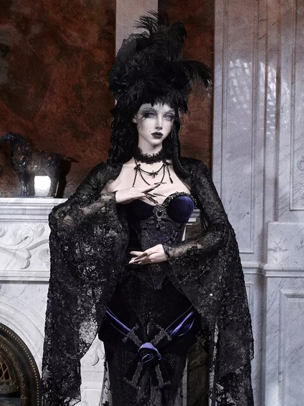 Full-length gothic lolita corset gown with dark blue velvet accents and rose decorations - model wearing feathered headdress in vintage fireplace setting